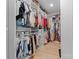 Spacious walk-in closet with custom shelving and ample storage for clothes, shoes, and accessories at 18027 Wilbanks Dr, Charlotte, NC 28278