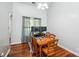 Cozy dining area showcasing hardwood floors, natural light, and comfortable seating for Gathering meals at 181 Brook Glen Dr # 56, Mooresville, NC 28115
