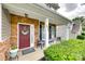 Inviting front porch with stone accents, seating, and a decorative wreath creating a warm and welcoming entrance at 1930 Caprington Dr, Fort Mill, SC 29707