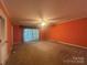 Large, carpeted bedroom with lots of light and closet space at 195 Keats Rd, Mooresville, NC 28117