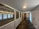 View of the entryway with slate flooring, detailed trim, and natural light at 195 Keats Rd, Mooresville, NC 28117