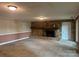 Spacious living room features a stone fireplace and neutral carpet at 195 Keats Rd, Mooresville, NC 28117