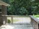 Backyard deck featuring wooden railings and wooded views at 2116 Upson Dr, Lancaster, SC 29720