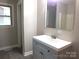 Modern bathroom with updated vanity, mirror, and neutral paint at 2116 Upson Dr, Lancaster, SC 29720