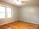 Bright bedroom with hardwood floors, large windows, and neutral walls at 2116 Upson Dr, Lancaster, SC 29720
