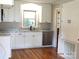 Well-lit kitchen showcasing stainless steel dishwasher and granite countertops at 2116 Upson Dr, Lancaster, SC 29720