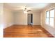 Inviting living room with hardwood floors, neutral walls, and ceiling fan at 2116 Upson Dr, Lancaster, SC 29720