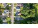 An aerial view highlights well-maintained homes and verdant landscapes in the neighborhood at 215 Cedar St, Belmont, NC 28012