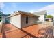 View of backyard deck with space for entertaining at 215 Cedar St, Belmont, NC 28012