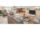 Spacious finished basement boasts a fireplace, comfortable seating, and bright lighting at 220 Augusta Dr, Statesville, NC 28625
