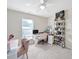 Bright bedroom with a large window and ample storage space at 2203 Whitford Ln, Charlotte, NC 28210