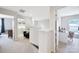 Upstairs hallway with easy access to laundry room and bedroom at 2203 Whitford Ln, Charlotte, NC 28210