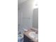 Functional bathroom with a tub/shower combo, vanity with sink, and neutral decor at 2440 Mint Thistle Ct, Charlotte, NC 28269