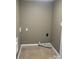 Empty laundry room area with beige colored walls at 2440 Mint Thistle Ct, Charlotte, NC 28269