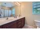 Bathroom features double sinks, vanity, and neutral paint at 2630 Filson Ct, Charlotte, NC 28214