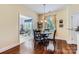 Cozy dining room showcasing wood floors and lots of natural light at 2630 Filson Ct, Charlotte, NC 28214