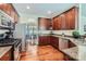 Well-equipped kitchen featuring granite countertops, stainless steel appliances, and ample cabinet space for storage at 2630 Filson Ct, Charlotte, NC 28214