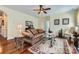 Warm living room with hardwood floors, a plush sofa, and elegant decor creates a comfortable atmosphere at 2630 Filson Ct, Charlotte, NC 28214
