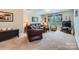Cozy living room with plush leather seating and natural light at 2630 Filson Ct, Charlotte, NC 28214