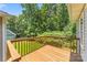 View from a wooden deck overlooking the lush backyard and mature trees at 267 Winthrow Creek Rd, Mooresville, NC 28115