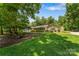 Charming home with beautifully landscaped front yard, mature trees, and inviting curb appeal at 267 Winthrow Creek Rd, Mooresville, NC 28115