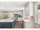 Spacious kitchen featuring stainless appliances, large island, and white cabinets at 267 Winthrow Creek Rd, Mooresville, NC 28115