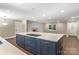 Bright, open living room featuring a large island, fireplace, and plenty of natural light at 267 Winthrow Creek Rd, Mooresville, NC 28115