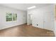 Spacious open-plan living room with plenty of natural light and hardwood floors at 267 Winthrow Creek Rd, Mooresville, NC 28115