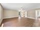 Spacious main bedroom with hardwood floors, a ceiling fan, and a walk-in closet at 267 Winthrow Creek Rd, Mooresville, NC 28115