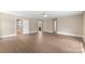 Large main bedroom featuring hardwood floors, a ceiling fan, and two closets at 267 Winthrow Creek Rd, Mooresville, NC 28115