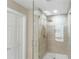 Modern shower showcasing stylish tile, glass enclosure, and rainfall showerhead for a spa-like experience at 267 Winthrow Creek Rd, Mooresville, NC 28115
