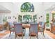 Elegant dining room with a large window, perfect for entertaining and enjoying meals with a scenic view at 2704 Apache Trl, Denver, NC 28037
