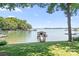 Picturesque lake view with a private dock, perfect for boating, swimming and enjoying the natural beauty at 2704 Apache Trl, Denver, NC 28037