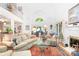 Spacious living room with large windows, offering plenty of natural light and a stunning lake view at 2704 Apache Trl, Denver, NC 28037