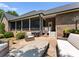 Brick patio and landscaped backyard provides a great spot for entertaining or relaxing at 2818 Levinfield Ct, Lincolnton, NC 28092