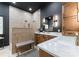 Spa bathroom features a neutral tile shower, double sink vanity with quartz countertops at 2818 Levinfield Ct, Lincolnton, NC 28092