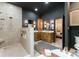 The spa bathroom features a tiled shower, double sink vanity, and soaking tub at 2818 Levinfield Ct, Lincolnton, NC 28092