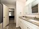 Bathroom showcases double sinks with granite countertops and stylish fixtures, opening to bedroom at 285 Hannah Ave, Salisbury, NC 28147