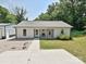 Cozy single-story home with a bench on the porch and a well-manicured lawn at 285 Hannah Ave, Salisbury, NC 28147