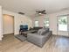 Relaxing living room with hardwood floors, television and a ceiling fan overlooking the front yard at 285 Hannah Ave, Salisbury, NC 28147