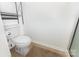 Functional bathroom features a toilet and chrome shelving for efficient storage at 2916 Northwood Dr, Monroe, NC 28110