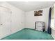Bright bedroom with natural light, complemented by a closet and convenient double door at 2916 Northwood Dr, Monroe, NC 28110