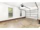 Spacious garage with windows for natural light and ample room for parking at 2916 Northwood Dr, Monroe, NC 28110