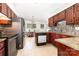 Well-lit kitchen features stainless steel appliances, granite countertops, and ample cabinet space at 2916 Northwood Dr, Monroe, NC 28110