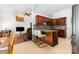Open concept kitchen with bar seating seamlessly connects to the living area at 2916 Northwood Dr, Monroe, NC 28110