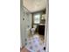 Traditional bathroom featuring a shower-tub combo, toilet, and single sink vanity at 300 Gurley St, Kannapolis, NC 28081