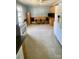 Eat-in kitchen with cabinetry, tile floors, and appliances at 300 Gurley St, Kannapolis, NC 28081
