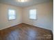Well-lit bedroom with hardwood floors and bright white paint at 326 Gorrell St, Shelby, NC 28152