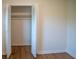 Bedroom closet with bi-fold doors and hanging rack providing storage at 326 Gorrell St, Shelby, NC 28152