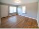 Inviting living room with hardwood floors, freshly painted walls, and plenty of natural light at 326 Gorrell St, Shelby, NC 28152